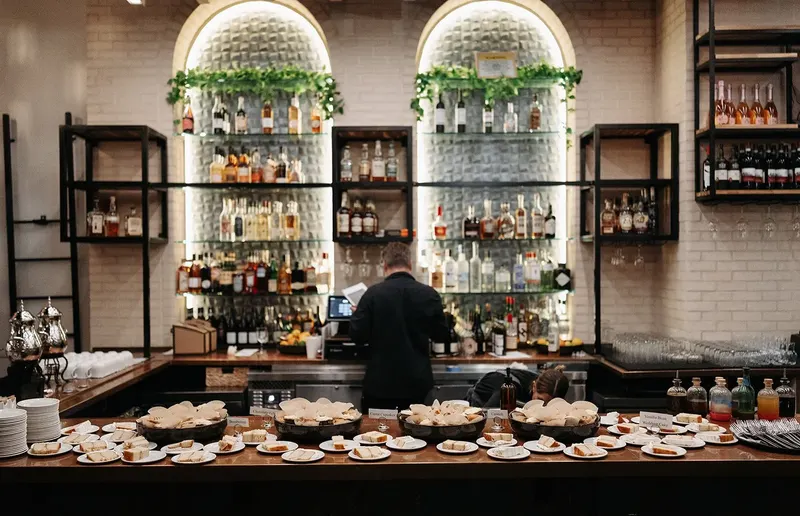 Culaccino’s bar with arched, backlit shelves